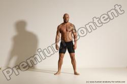 Underwear Gymnastic poses Man Black Muscular Bald Dancing Dynamic poses Academic